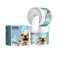 Soft silicone dog dental cleaning finger glove with tartar removal formula, shown with box.