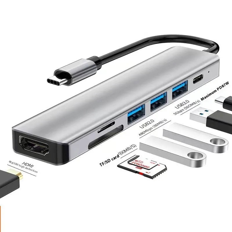 A compact 7-in-1 USB-C expansion dock with a 15cm cable, featuring HDMI and USB ports.