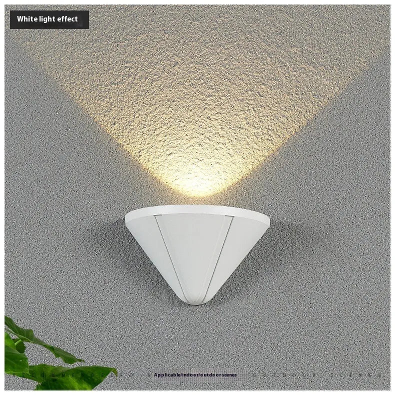 Black bird's nest design outdoor waterproof LED wall lamp with IP65 rating mounted on a wall.