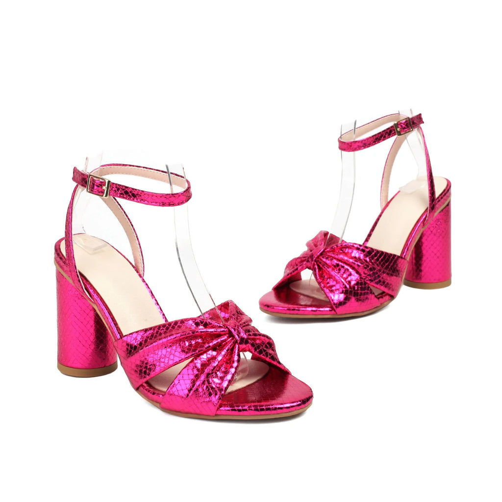 Plus size women's peep toe ankle strap sandals with a buckle in gold, on a white background.