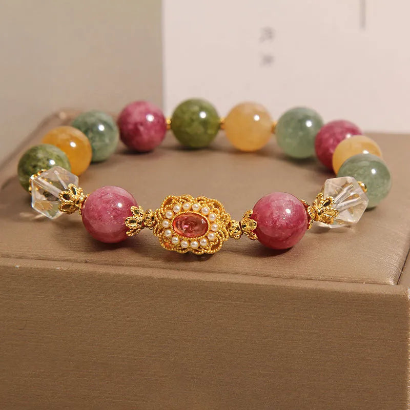 Women's jade colour tourmaline bracelet with alloy setting and rhinestone elements on pearl crystal base