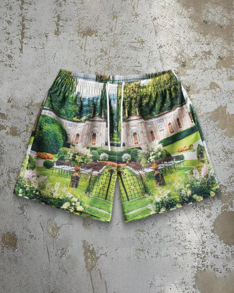 Mens loose fit quick-drying beach shorts with digital print design and elastic waistband in a light colour.
