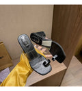 Toe covering transparent ankle-strap chunky heel outdoor slippers in black with black rubber sole and square head design