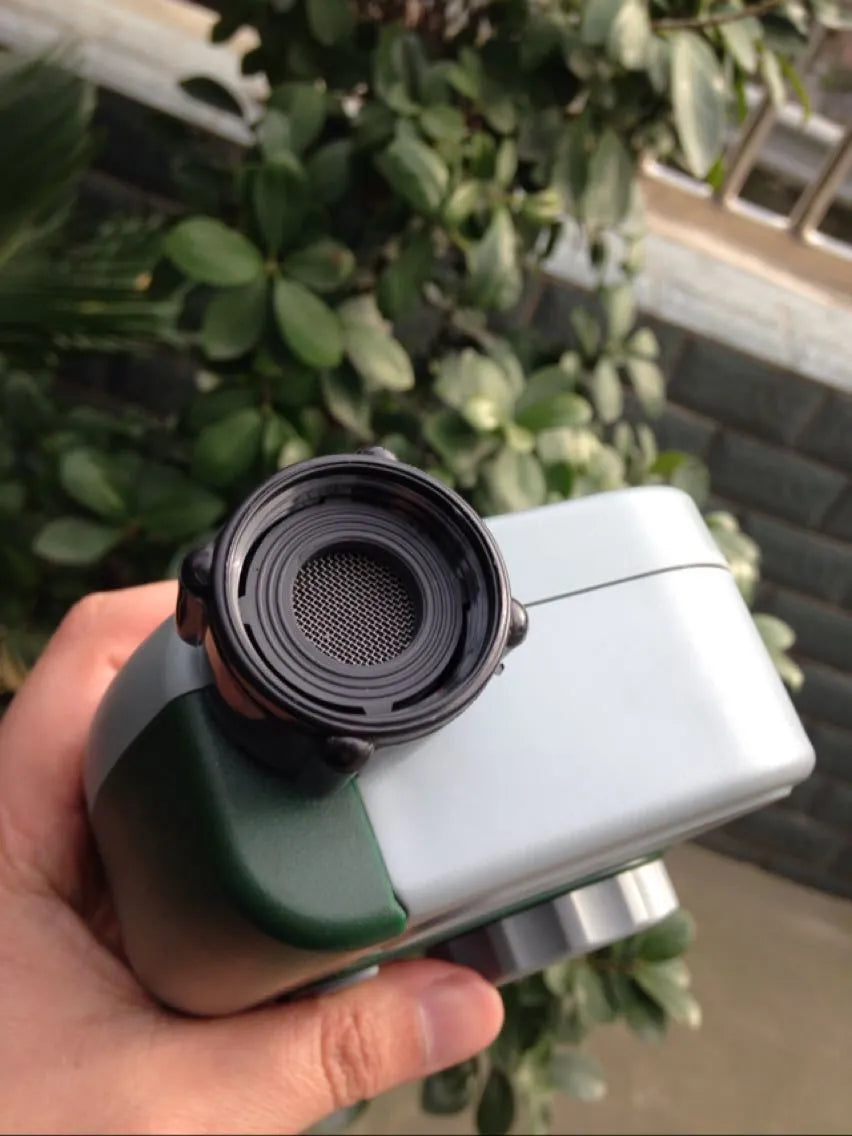 Green digital programmable garden hose water timer with large display and two outlet ports