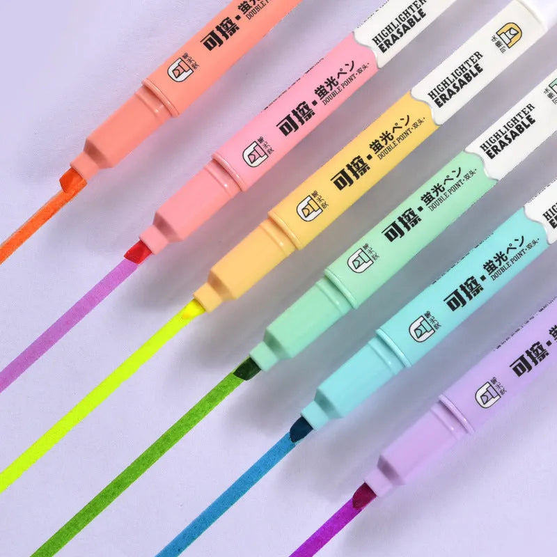 Six double-headed fluorescent marker pens in plastic casing with various coloured barrels