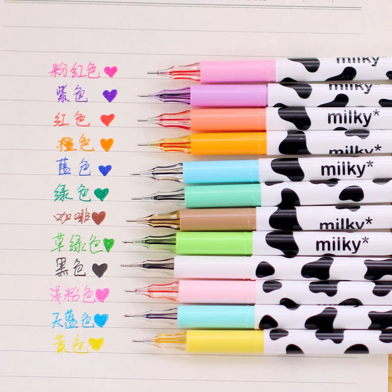 Box of 12 cow colour gel pens with 0.38mm tips showing assorted plastic barrels.