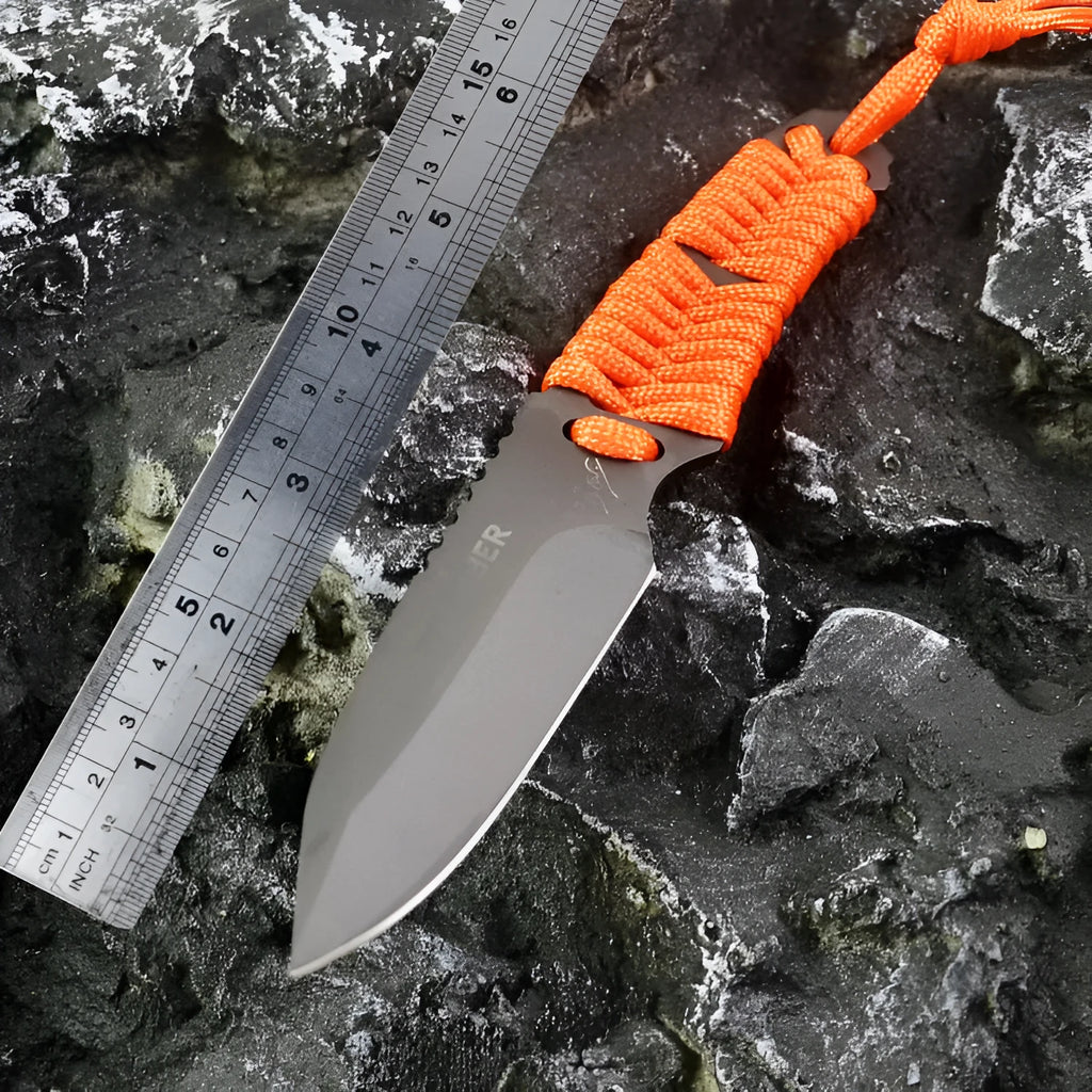 Multi-function survival knife with straight blade and rope handle showing ABS sheath