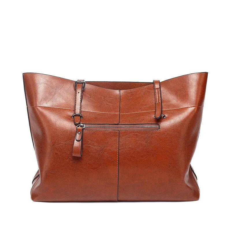 Brown leather crossbody handbag with multiple internal compartments showing dimensions 30cm wide by 37cm high.