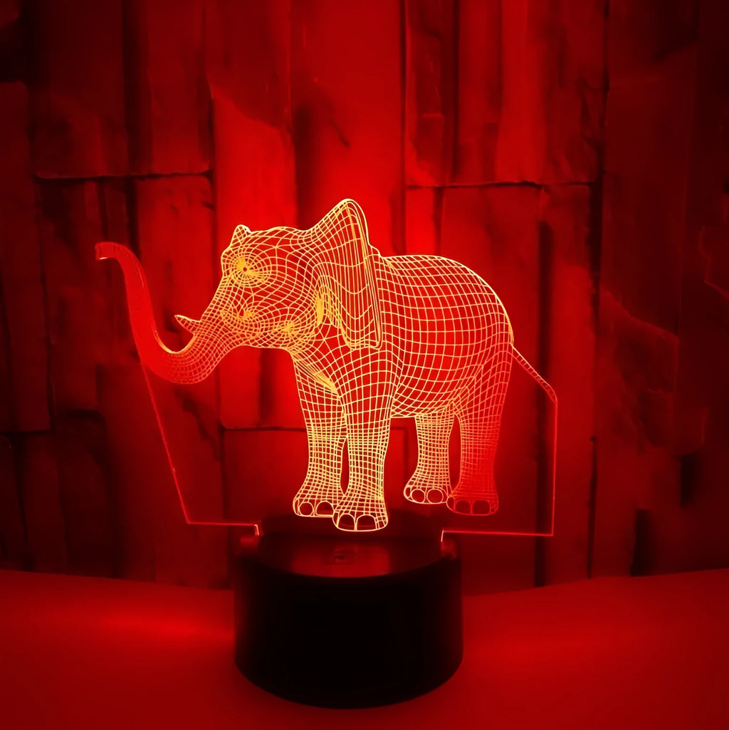 3D LED elephant touch lamp showing seven colour modes on a wooden desk