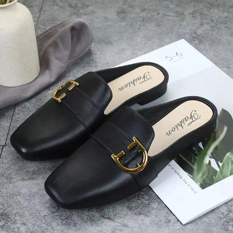 Women's PVC closed-toe half slippers with metal buckle in choice of colours.