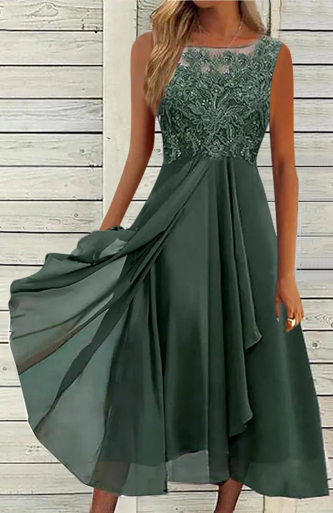 Women's sleeveless green chiffon dress with lace stitching and a mid-length skirt.