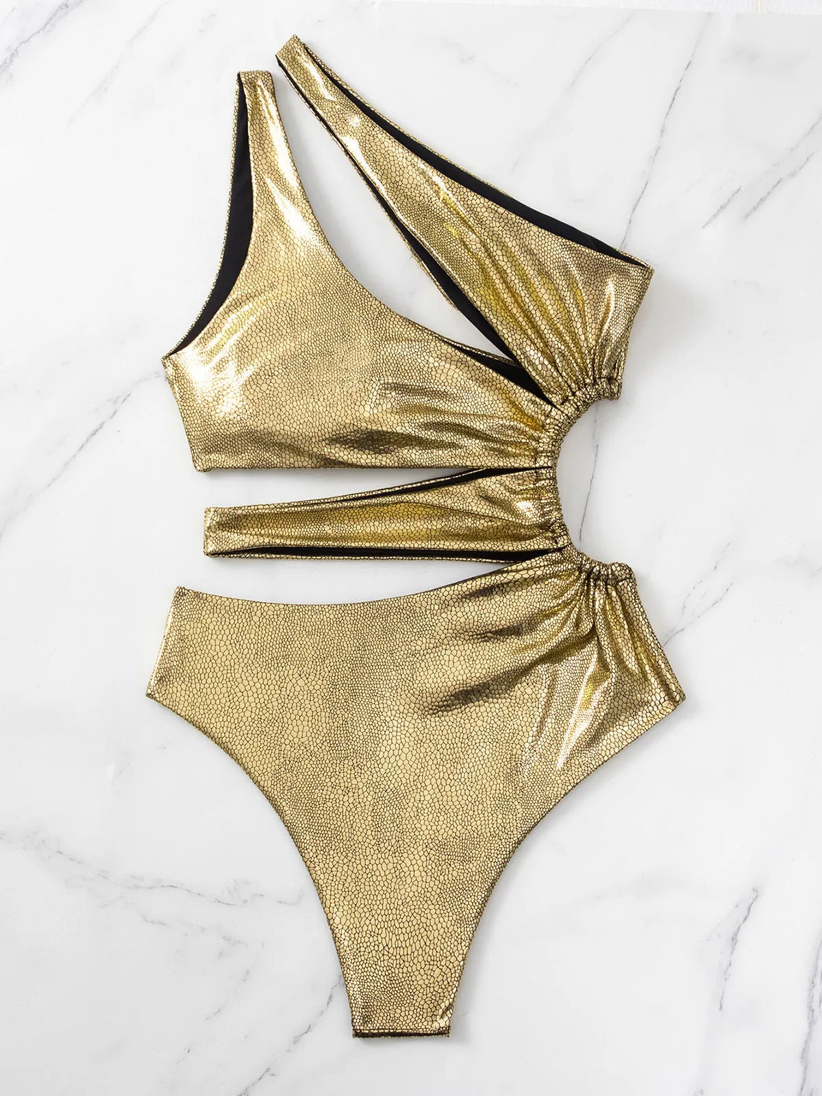 Women's gold backless one-piece swimsuit with sleeveless design and solid colour