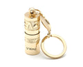 Gold electroplated zinc alloy portable LED keychain flashlight for outdoor emergency use.