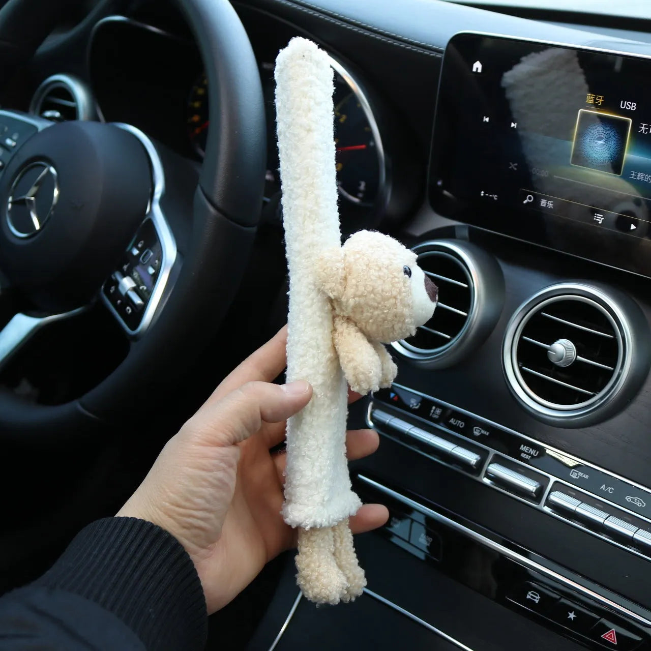 Plush lamb wool car seatbelt shoulder protector with cartoon rabbit and bear designs.