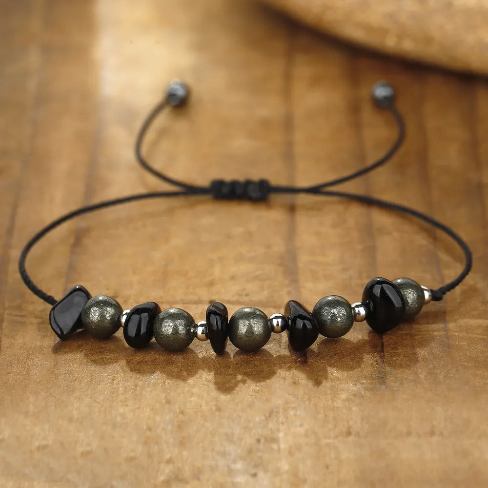Black geometric garnet stone bracelet with a moon charm for unisex wear