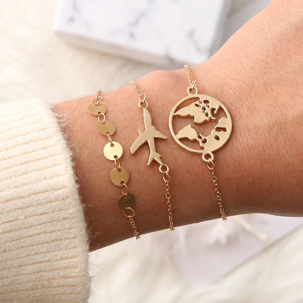 Three heart-shaped aircraft map charm bracelets with electroplated finish in bohemian style