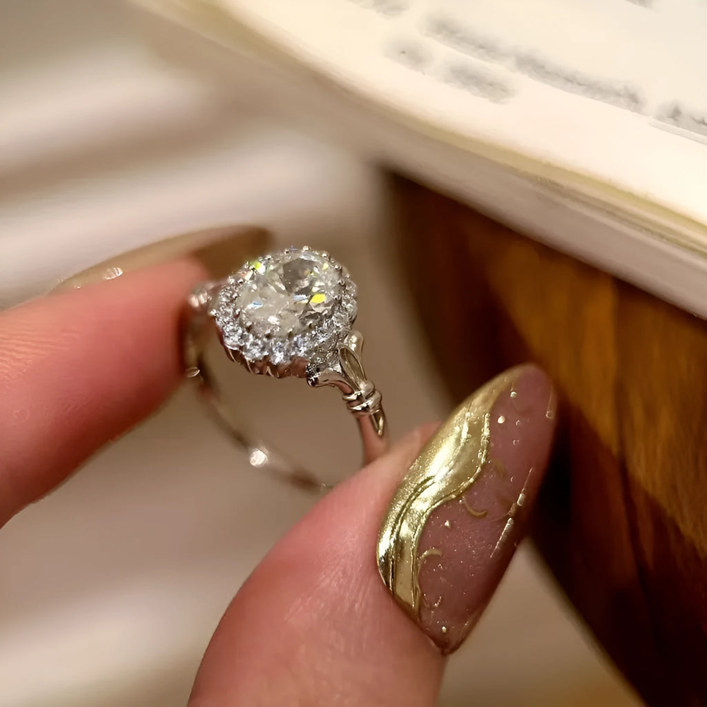 Silver adjustable ring with a large geometric bridal bouquet design and diamond treatment.