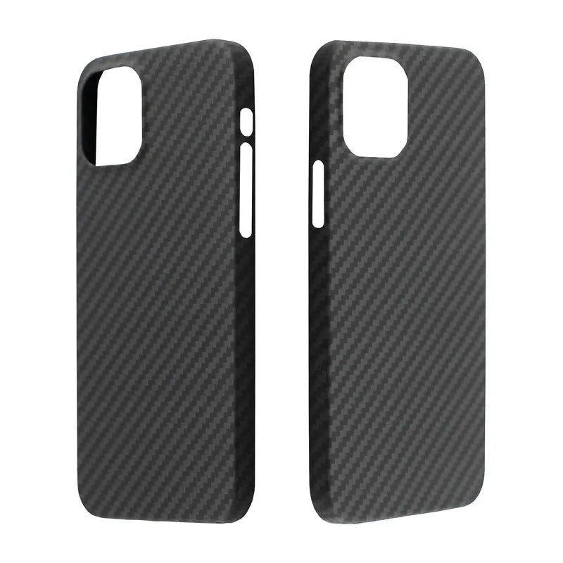 Dull black Kevlar iPhone case with volcanic crater texture next to a MagSafe charger.