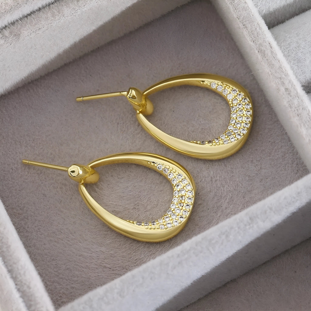 Women's yellow gold geometric drop earrings with 2.6cm length and round ring design elements