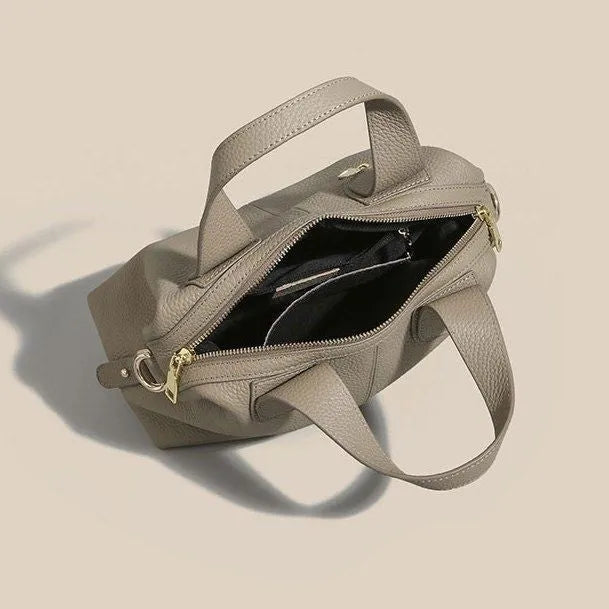 Women's genuine leather cross-body bag in horizontal square shape with internal compartments