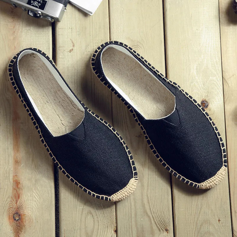 Men's solid colour canvas casual shoes with round toe in multiple size options.