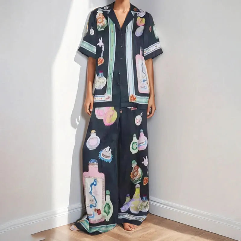Black women's casual set with cartoon pattern featuring cardigan top and trousers