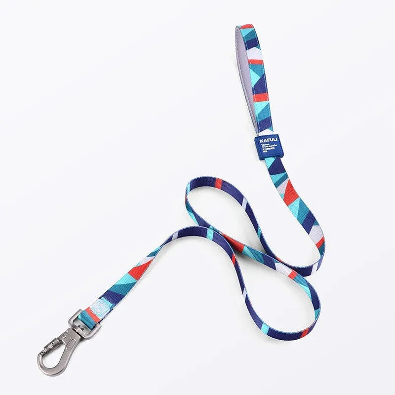 Blue polyester dog harness vest with attached haulage rope set on a white background.