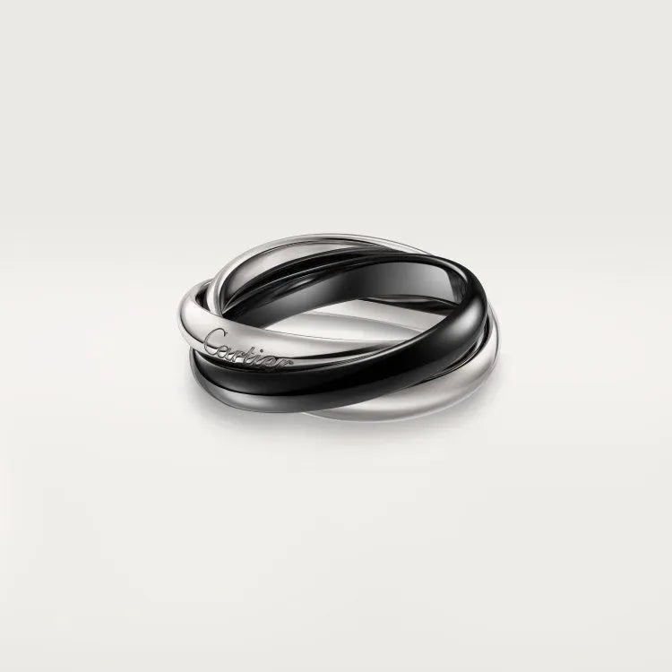 A geometric U-shaped silver couple ring set with diamonds, shown in rose gold and black colour variants.