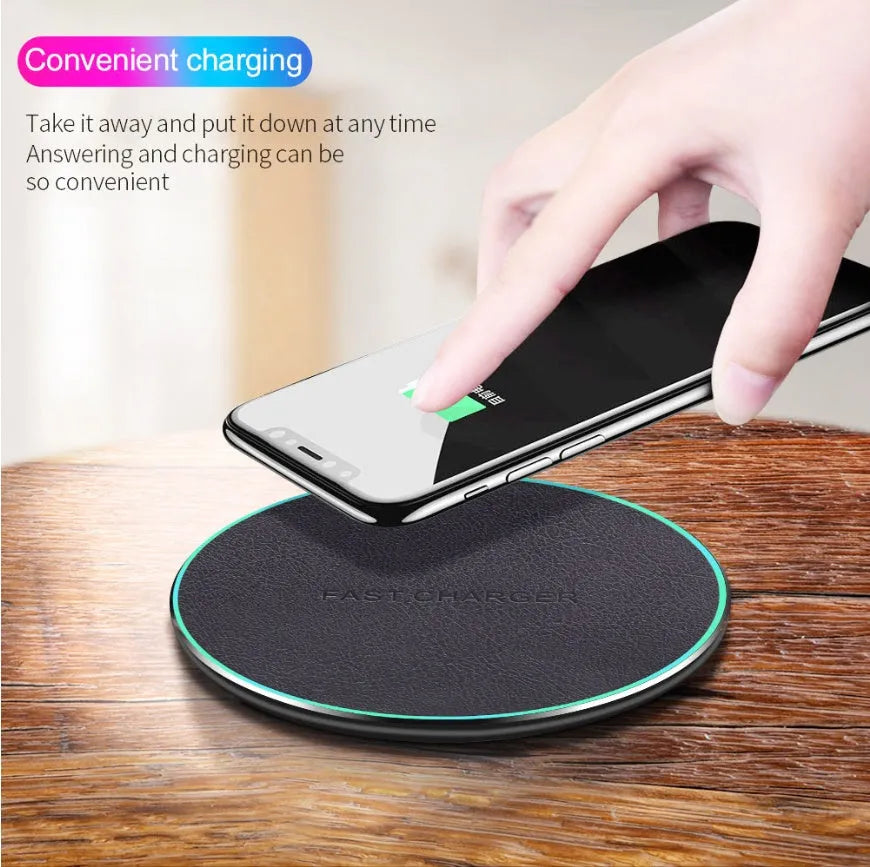 Black Qi wireless charging pad for iPhone 11 with non-slip surface and 10W fast charging