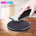 Black Qi wireless charging pad for iPhone 11 with non-slip surface and 10W fast charging