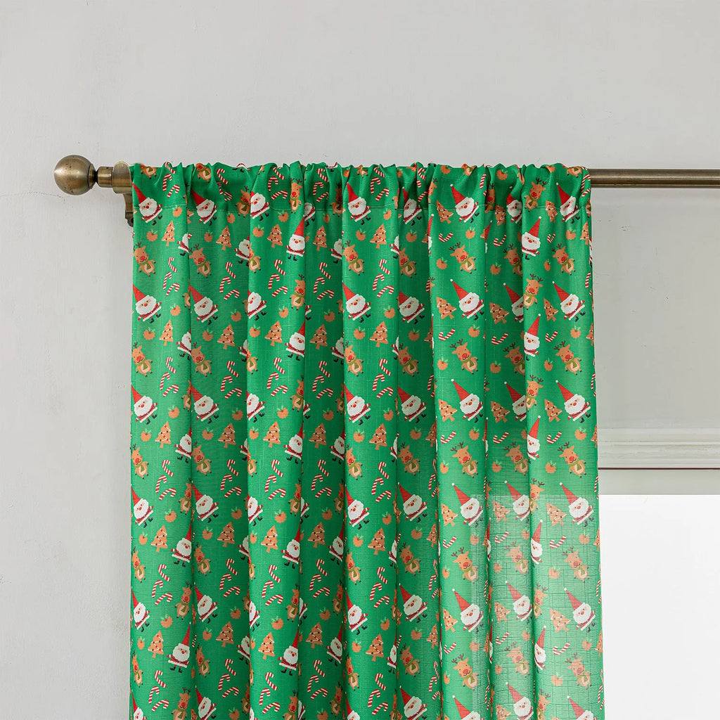 Christmas curtain with snowman and angel cartoon print in red or green, 1 metre length