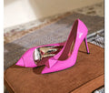 Pink patent leather women's stiletto heels with pointed toe, rivet details, and a buckle ankle strap.