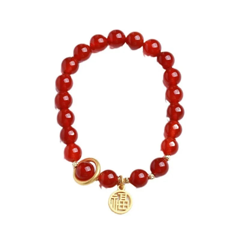 Natural red agate bracelet with hand-woven cord in national style, shown with blessing card.