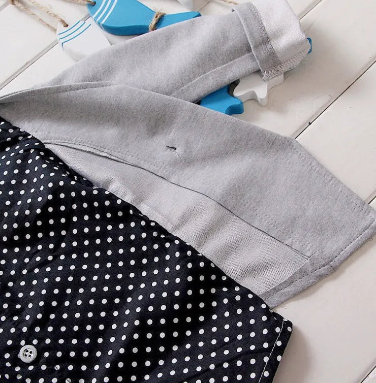 Casual blue kids sport suit consisting of a short-sleeved top and long trousers on a child mannequin.