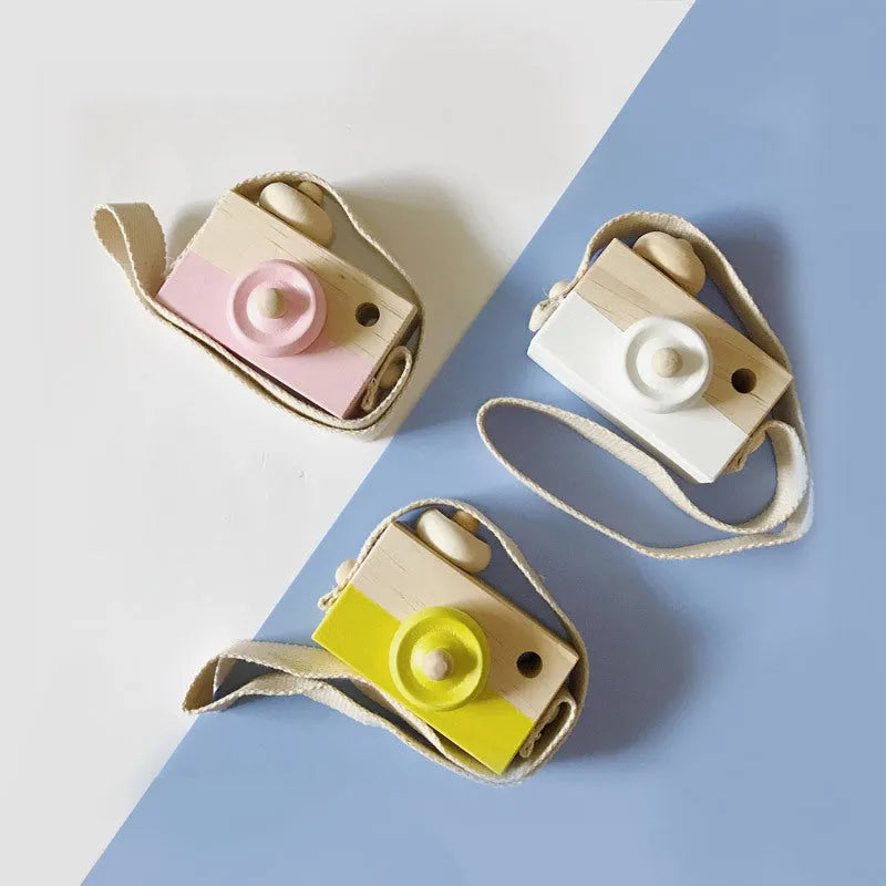 Wooden camera toy for kids in seven colours, unisex design, pivotable round part