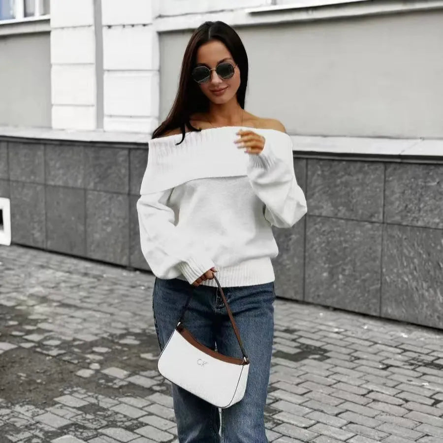 Grey off-the-shoulder pullover sweater with a textured 3D pattern on the front.