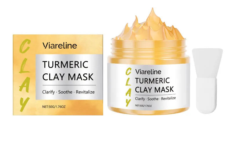 A 50g pot of yellow turmeric glossy mud mask with a small application brush.