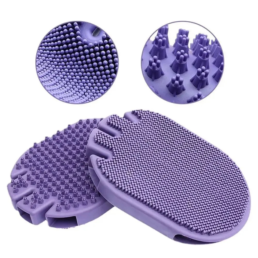 Purple dual-sided pet shampoo massage brush with soft TPR bristles and ergonomic handle.