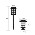 Black solar outdoor LED lawn light with window-style design for garden and pathway illumination