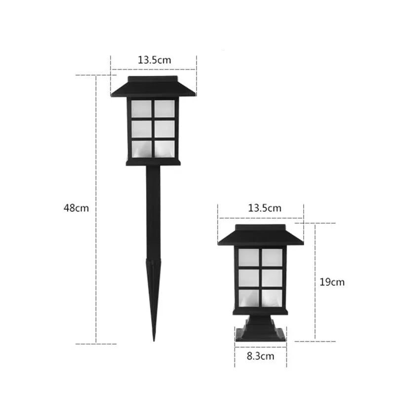 Black solar outdoor LED lawn light with window-style design for garden and pathway illumination
