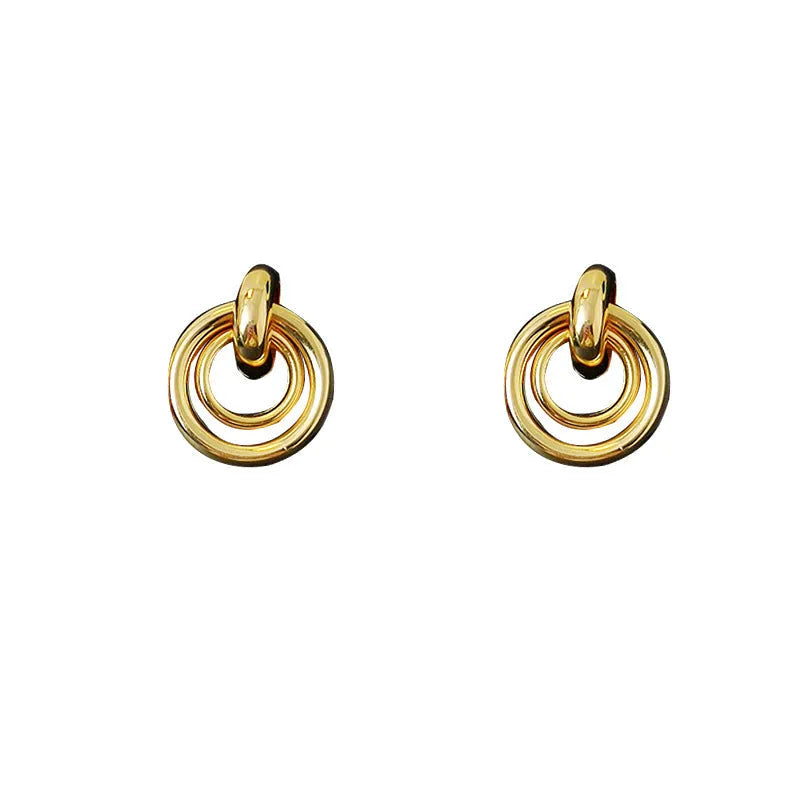 Geometric round ring drop earrings in gold or silver colour with irregular shape