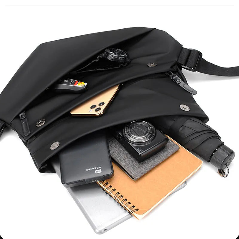 Grey PU leather men's crossbody sling backpack with zip and adjustable strap.