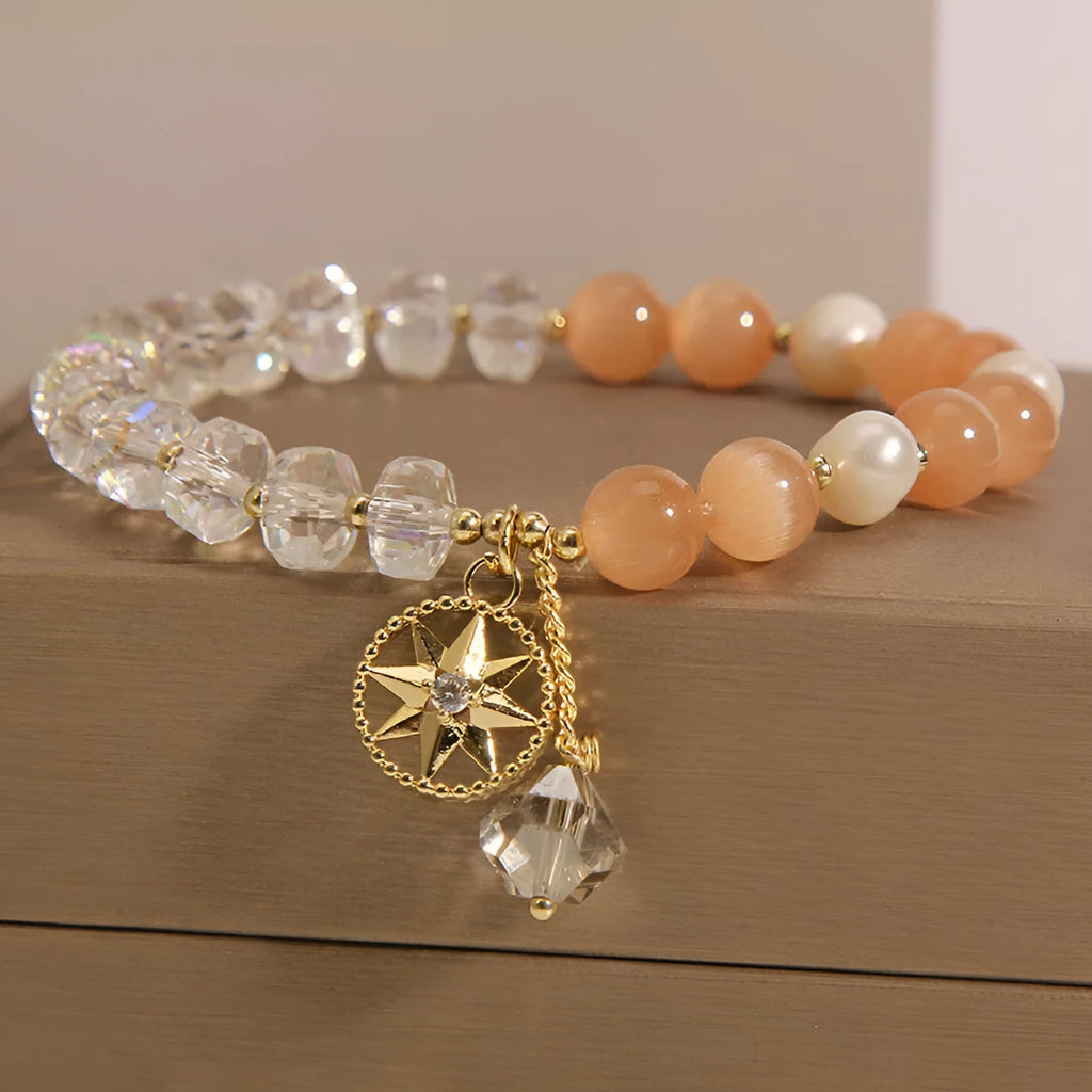 Orange eight Awn star women's bracelet with gold-plated inlay setting and opal crystal accents