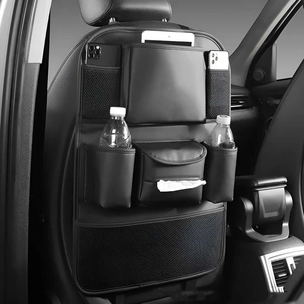 Genuine leather car seat back storage bag hanging from vehicle seat