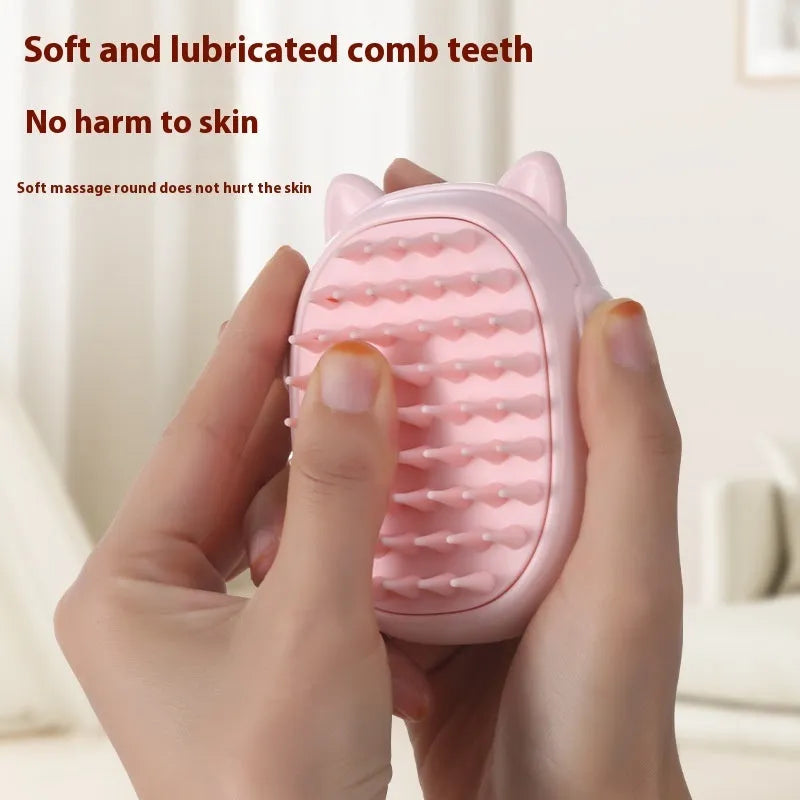 Pink and yellow multifunctional pet comb with integrated laser pointer for cats and dogs