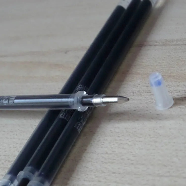 Automatic fade and disappear pen set showing pen holder and eight refill cartridges