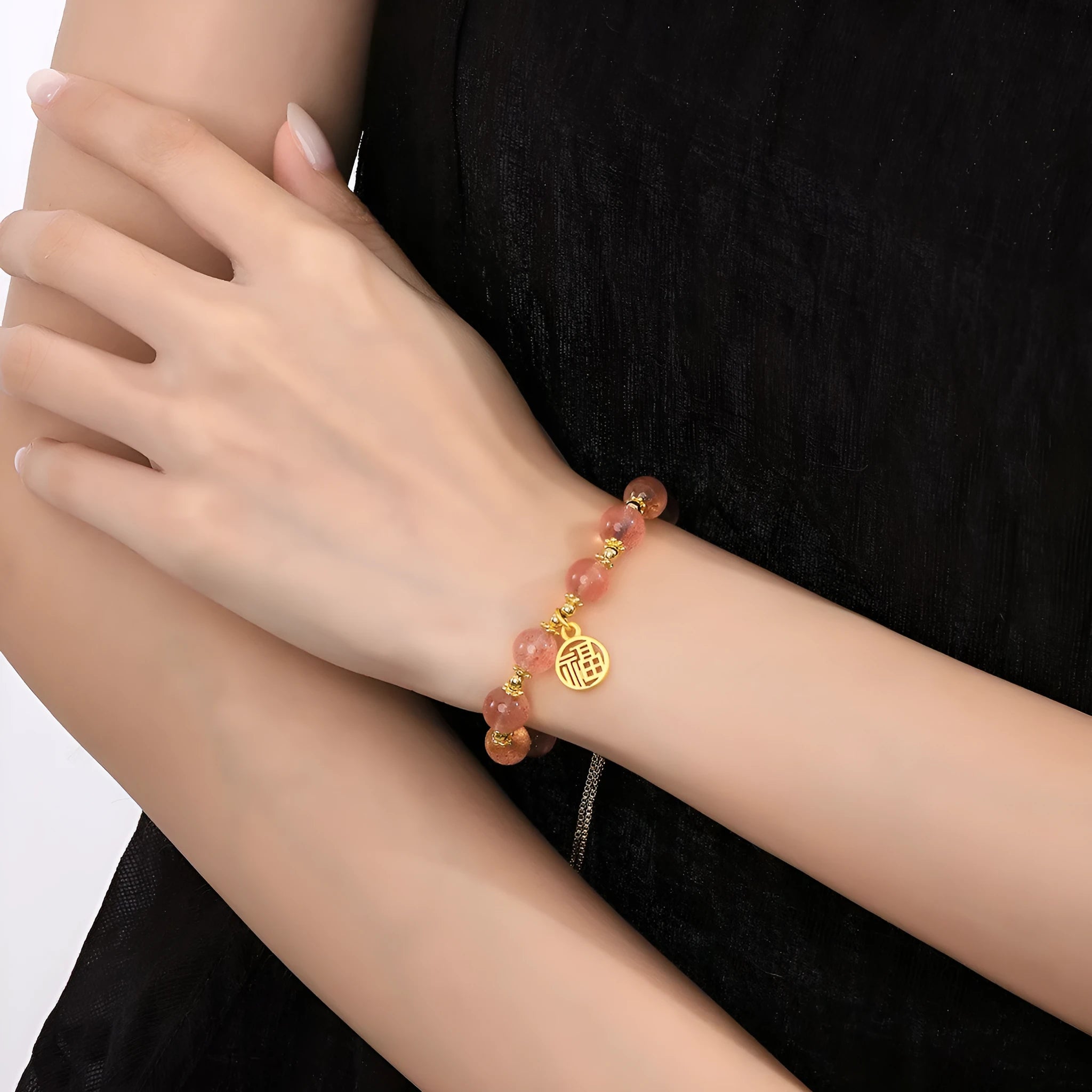 Strawberry quartz crystal bracelet with geometric shapes and fu character symbols