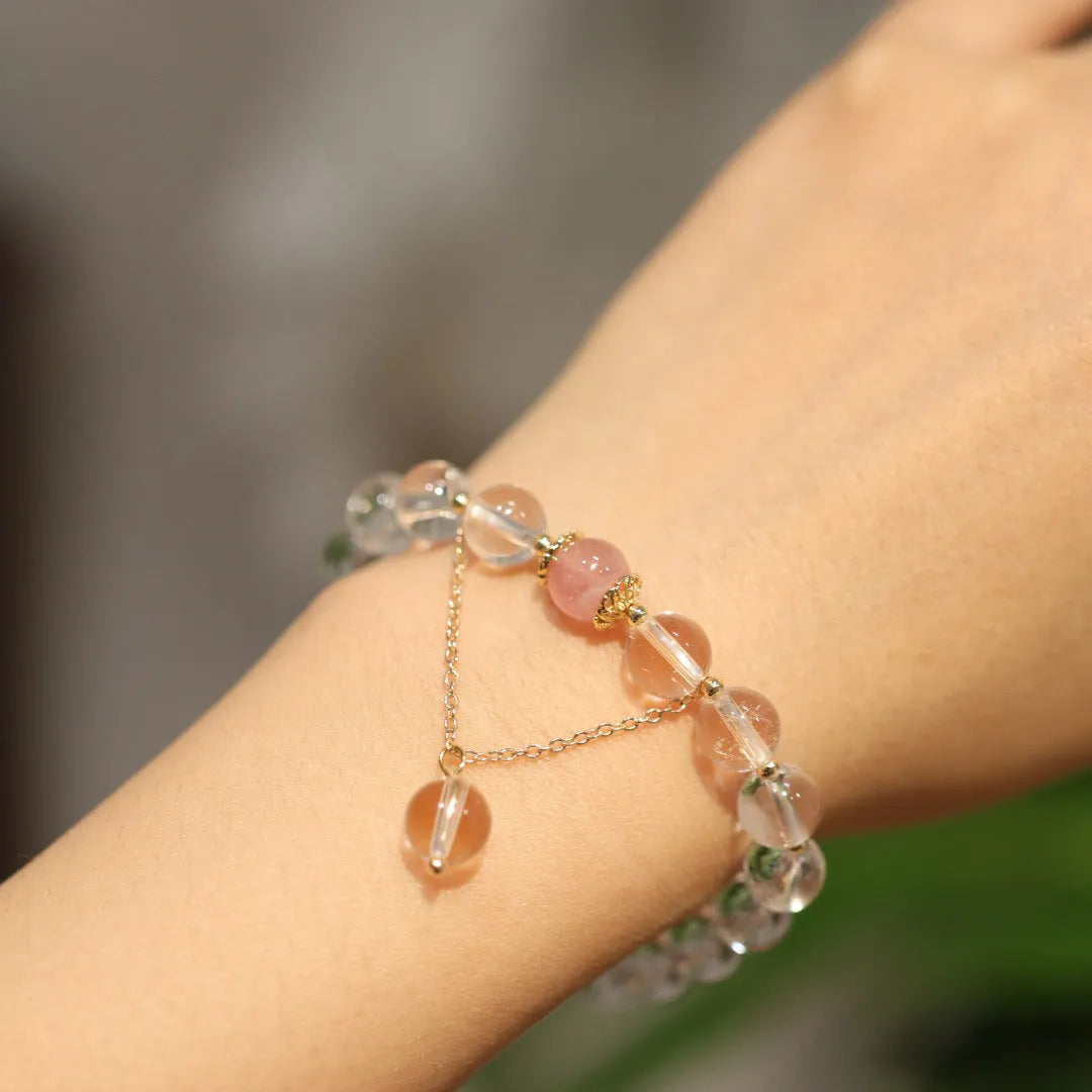 Chinese style geometric crystal bracelet with cat eye obsidian stone and auspicious patterns.