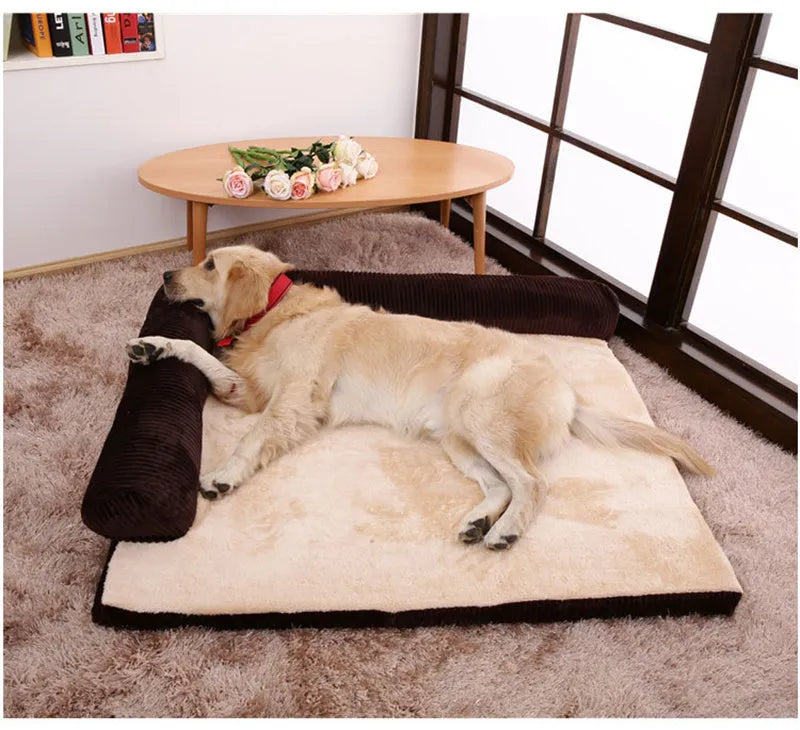 Corduroy bolster dog bed in grey with a removable cover, shown in a large (L) size on a hardwood floor.