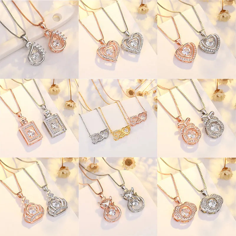 Silver love heart pendant necklace with crown and bow detail for women